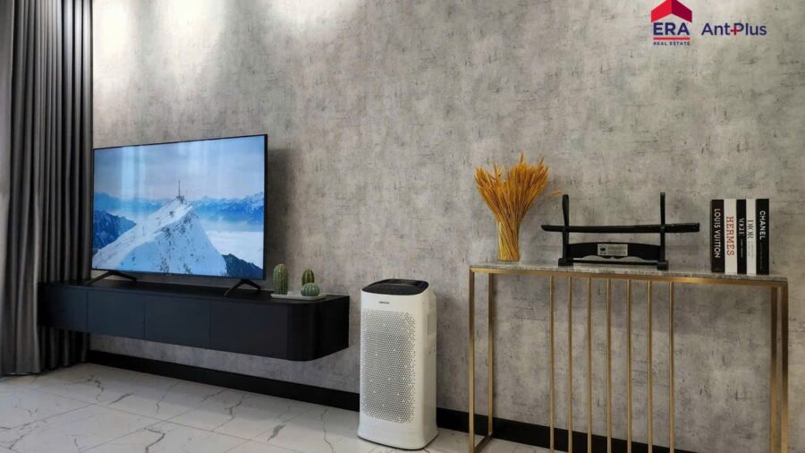Kệ TV và tường ốp xám phòng khách căn hộ 1 phòng ngủ Tilia