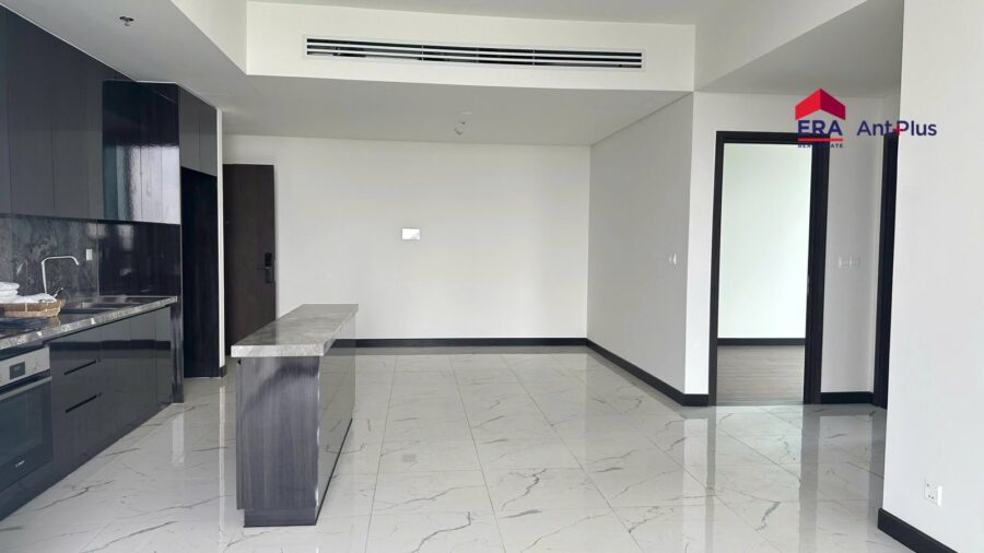 Phòng khách và bếp căn hộ 2PN Tilia T1C-20-03 bàn giao cơ bản