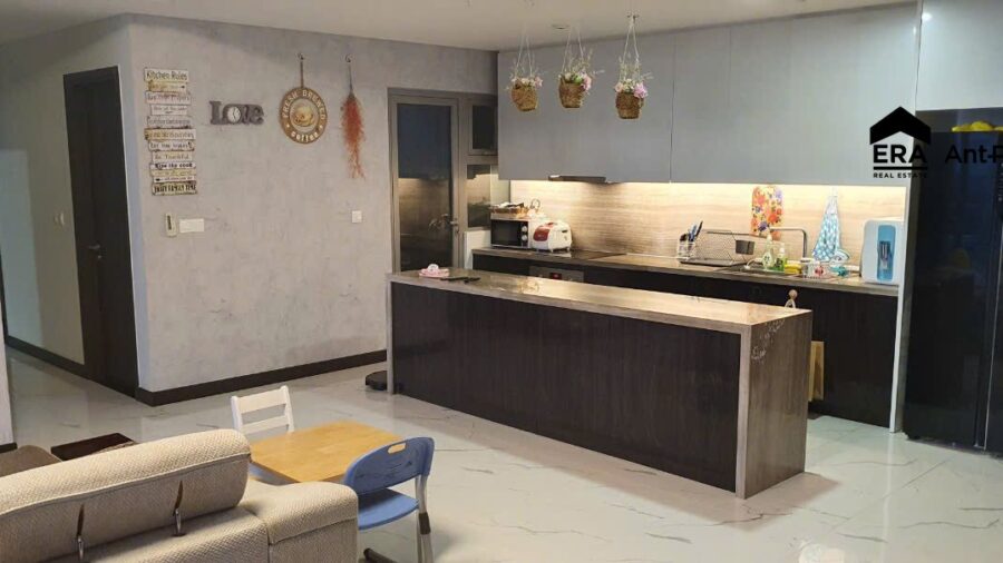 Bếp đảo và phòng khách căn hộ Linden T2A-13-07