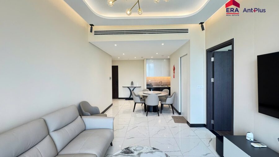 Phòng khách căn hộ cho thuê 1PN Linden với sofa xám và đèn trần