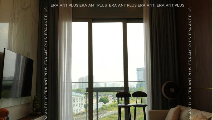 Cho thuê căn hộ 2PN Linden: phòng khách với đèn vòng tròn và sàn đá trắng
