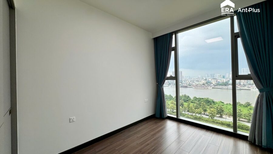 Phòng ngủ thứ hai căn hộ Tilia có cửa kính nhìn ra sông