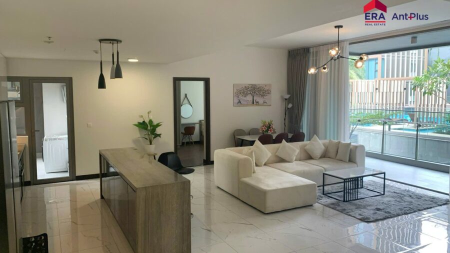 Phòng khách, đảo bếp và lối vào phòng ngủ căn hộ Linden T1B-02-06