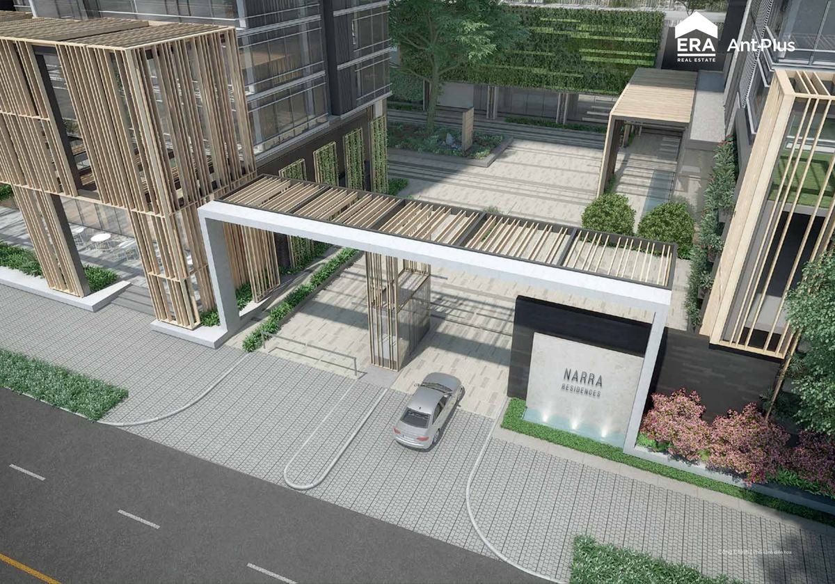 Cổng chính và sảnh đón cư dân Narra Residences với bảng hiệu dự án
